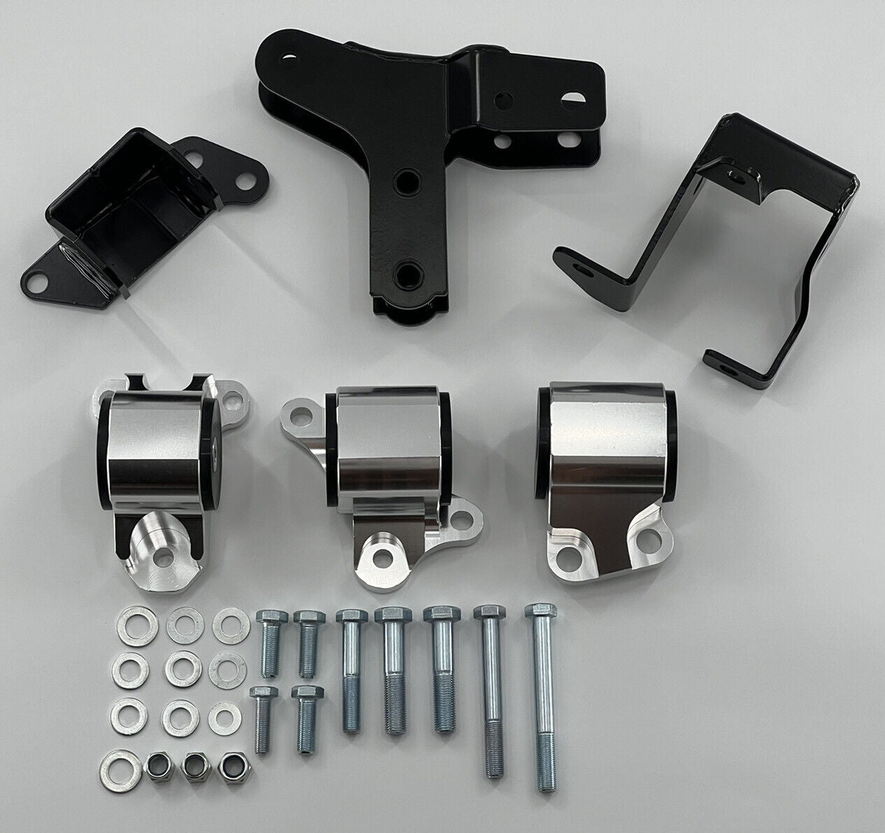Jack Spania Racing EK B Series AWD engine motor mount kit for Honda Civic 96-00 B16 B18 B20, showing the metal mount components.