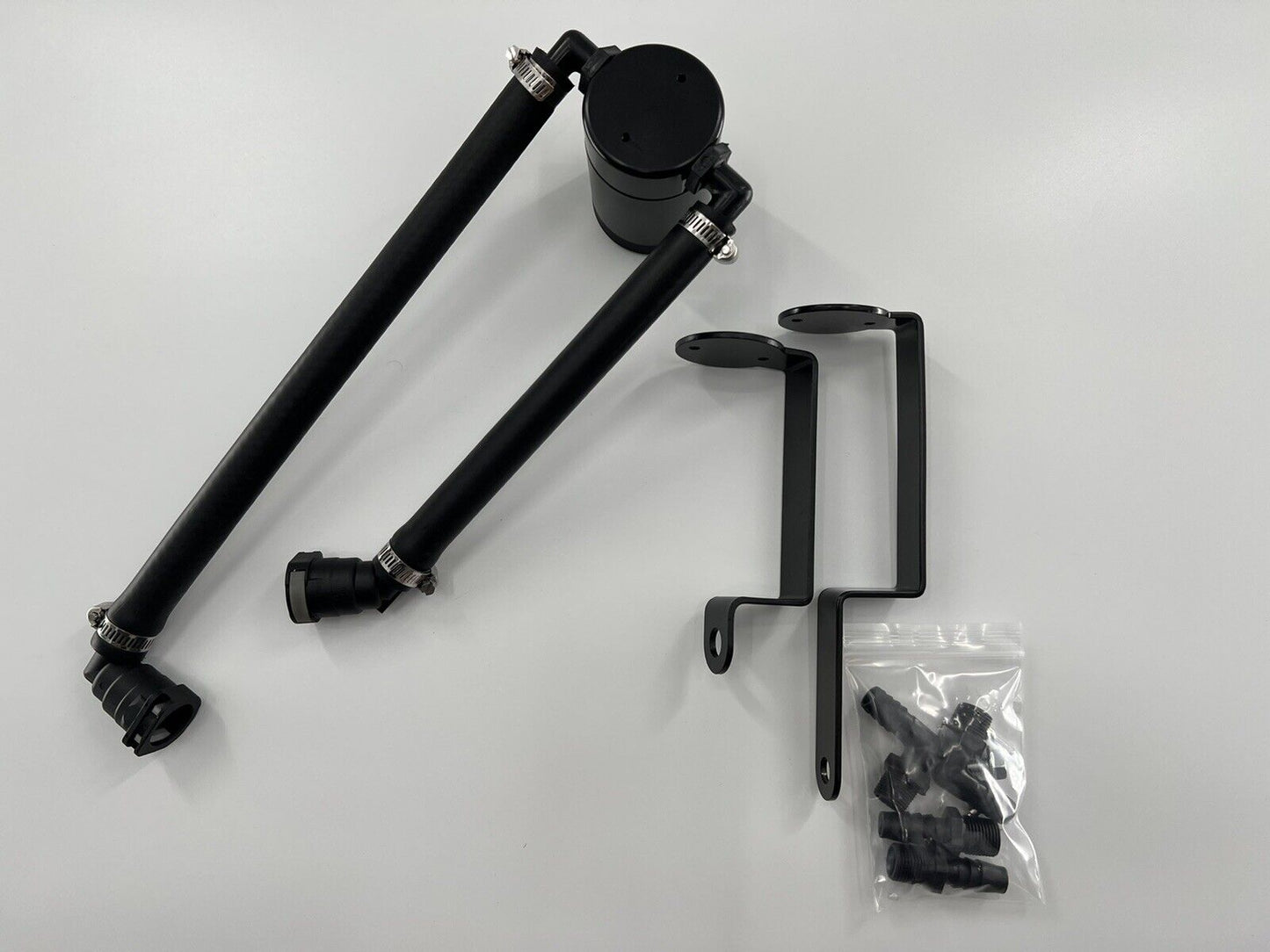 Jack Spania Racing oil separator catch can for 6.2 Supercharged Dodge Durango Hellcat Trackhawk engine, mounted on the engine bay.
