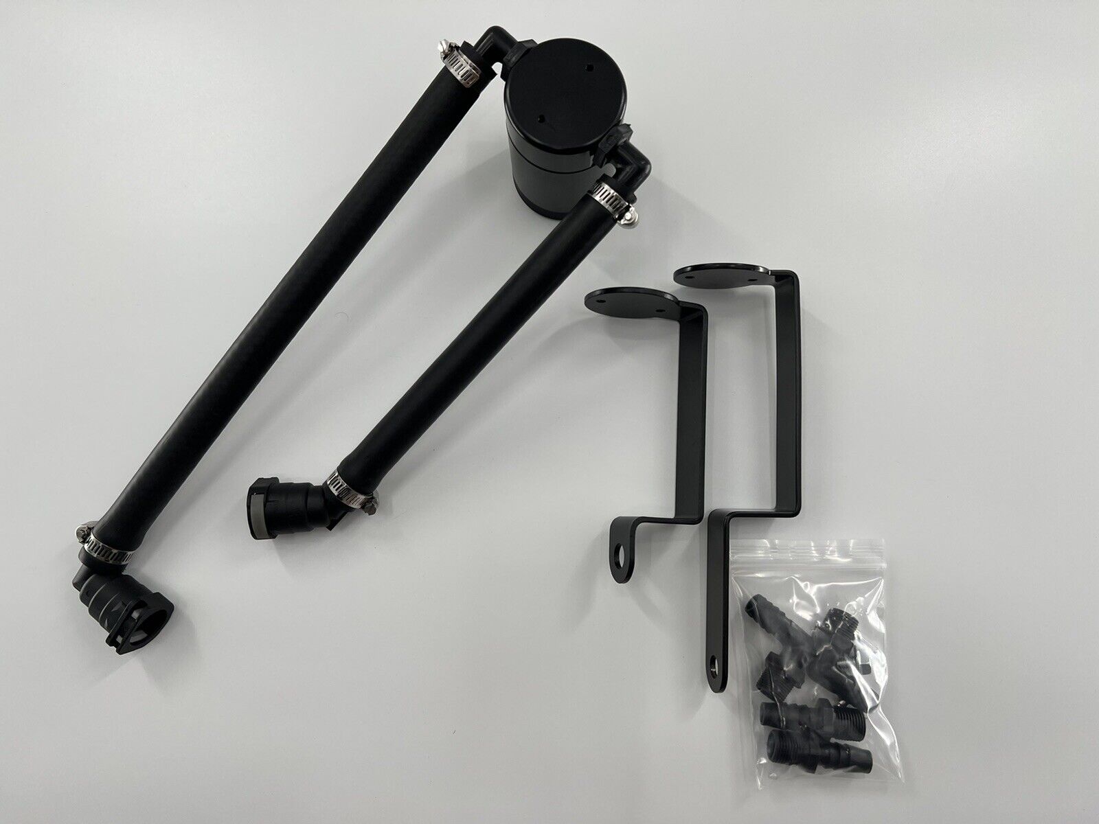 Jack Spania Racing oil separator catch can for 6.2 Supercharged Dodge Durango Hellcat Trackhawk engine, mounted on the engine bay.